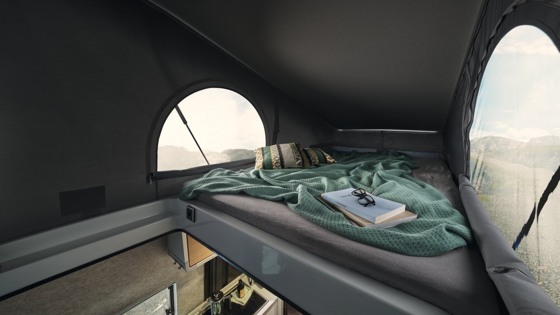 While falling asleep, you can admire the panorama through the windows in the side of the pop-top roof.