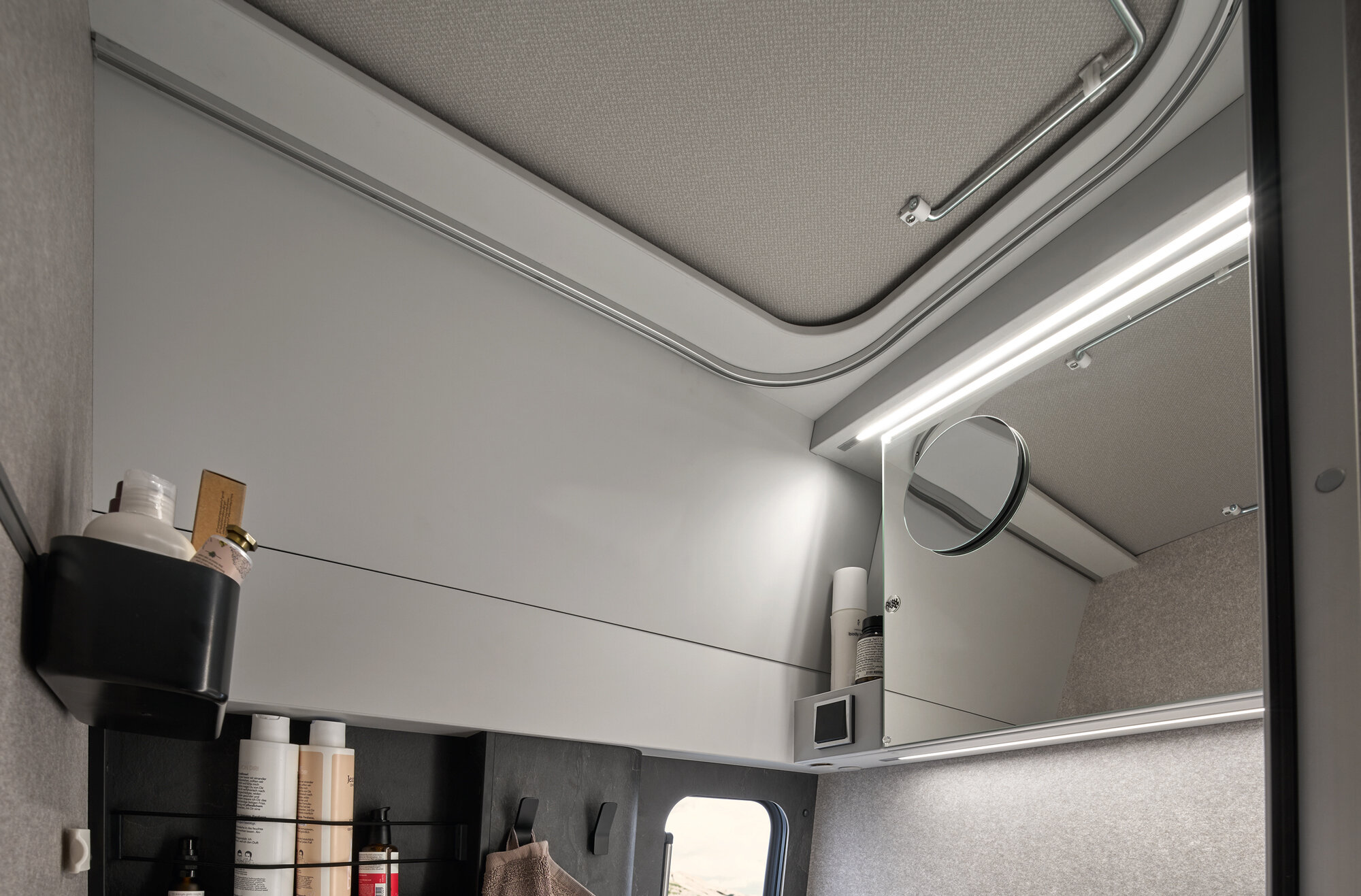 Clearly see what you’re doing when freshening up thanks to the illuminated mirror including the flexible, magnetic vanity mirror, as well as the abundance of storage space.