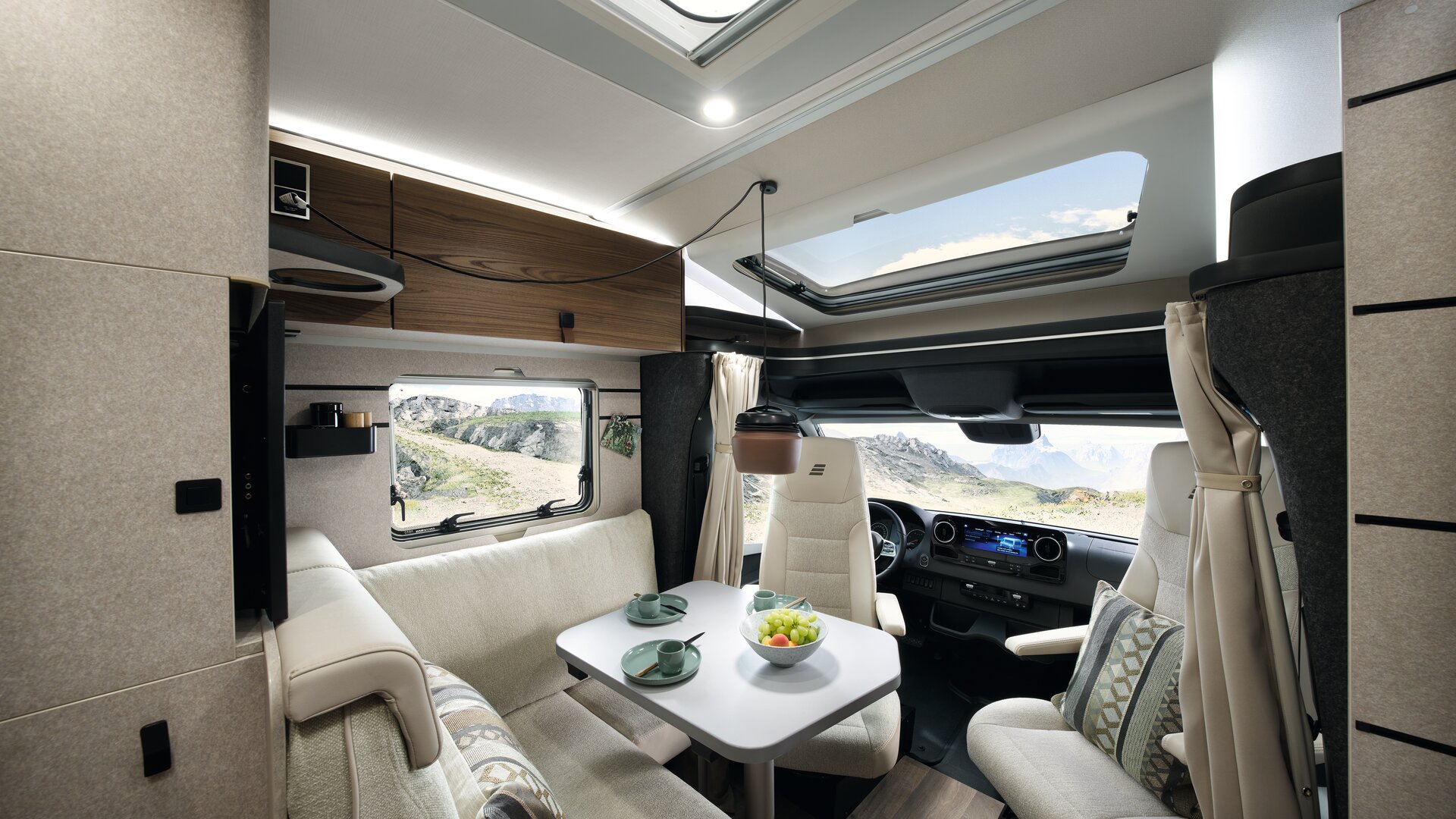 The panoramic skylight floods the living area with light during the day.