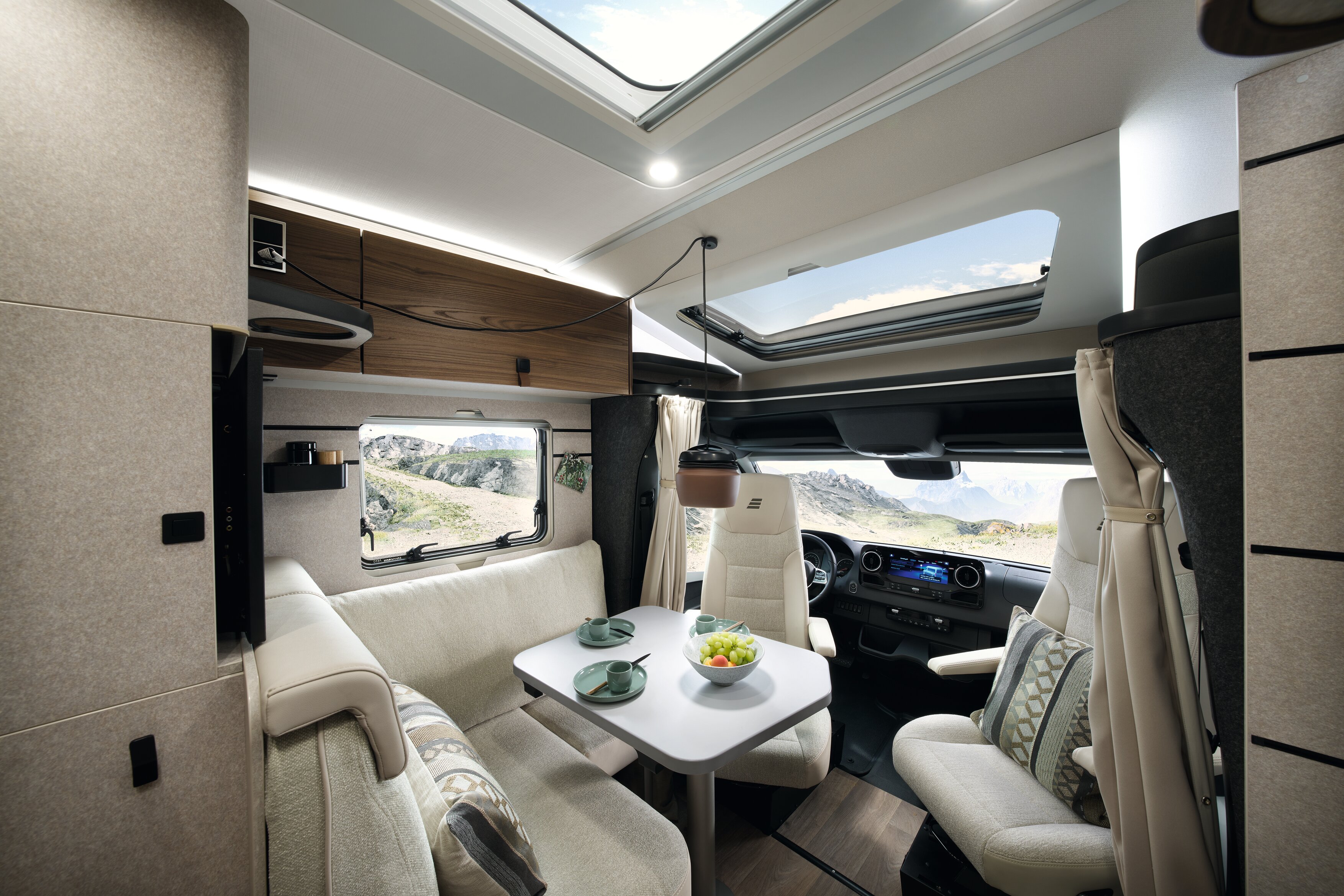 The panoramic skylight floods the living area with light during the day.