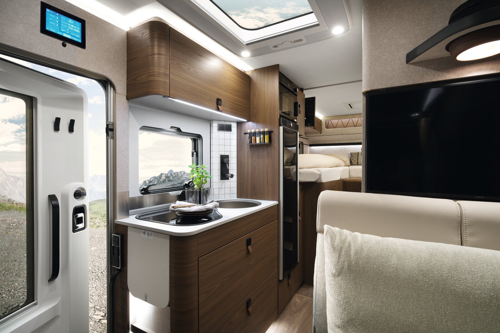 The illuminated panel on the end of the unit beautifully highlights the kitchen.