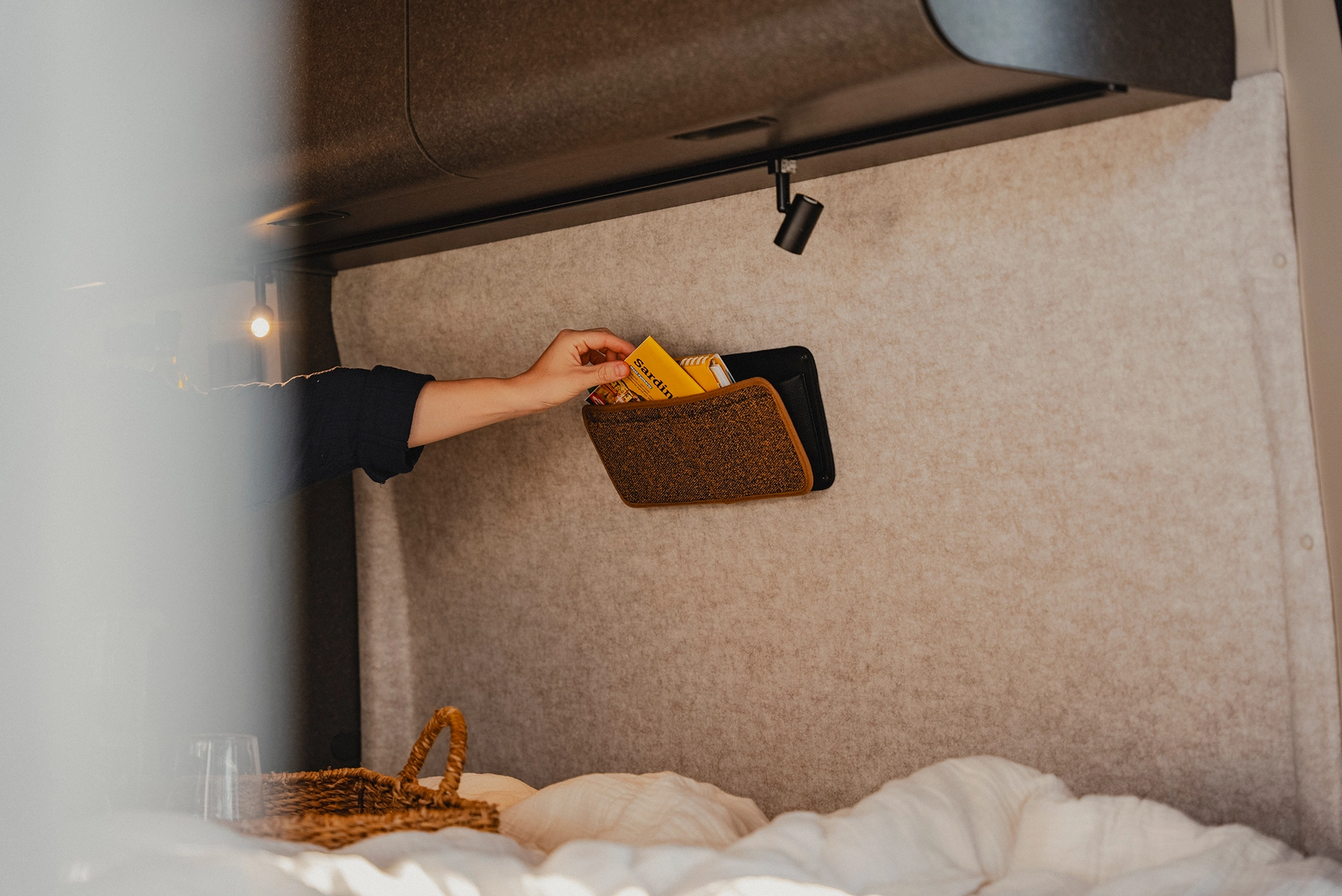 Small storage compartments, big impact – clever space for reading material, mobile phones and more in the Hymer Redwood.