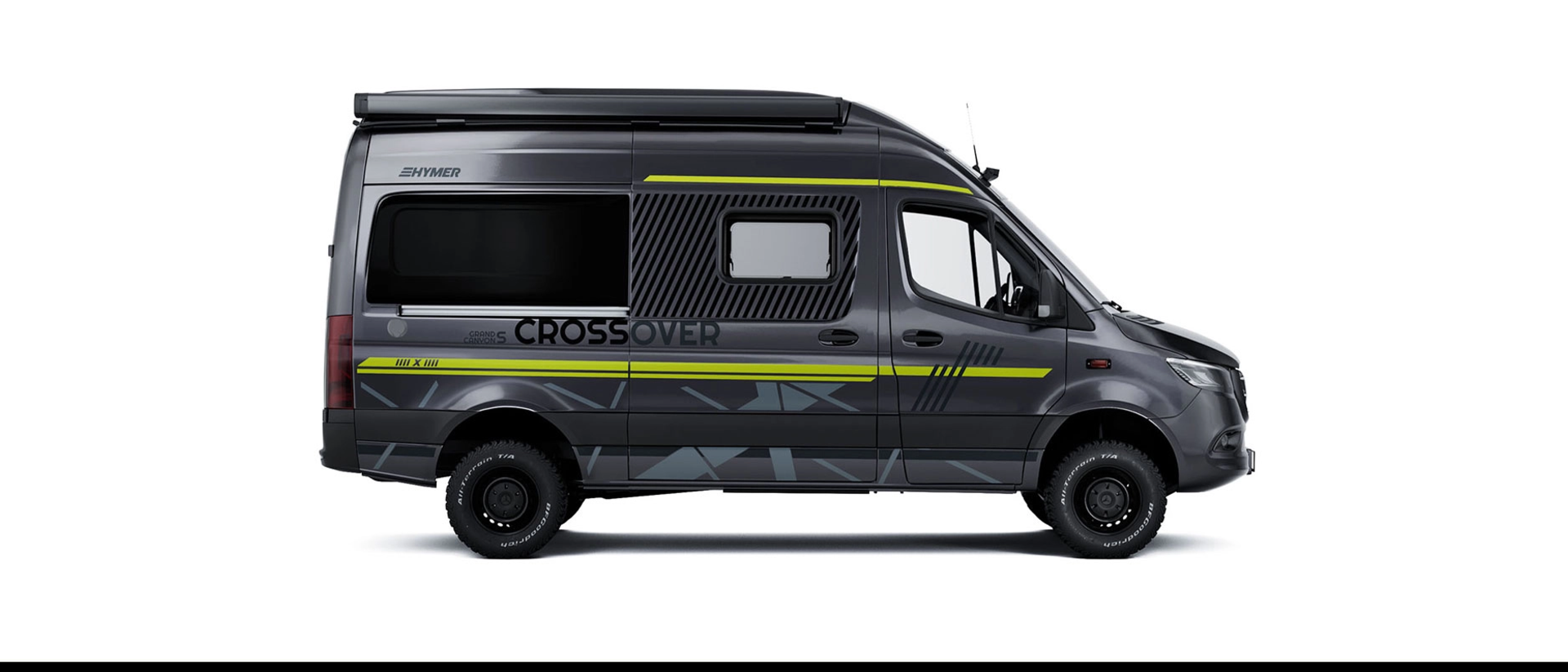 Side view of camper van, in black with special neon green decals, black rims, and black awning