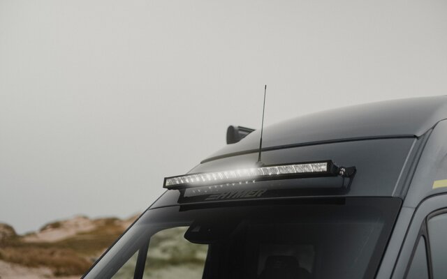 Lightbar on a camper van above the windshield, it is glowing