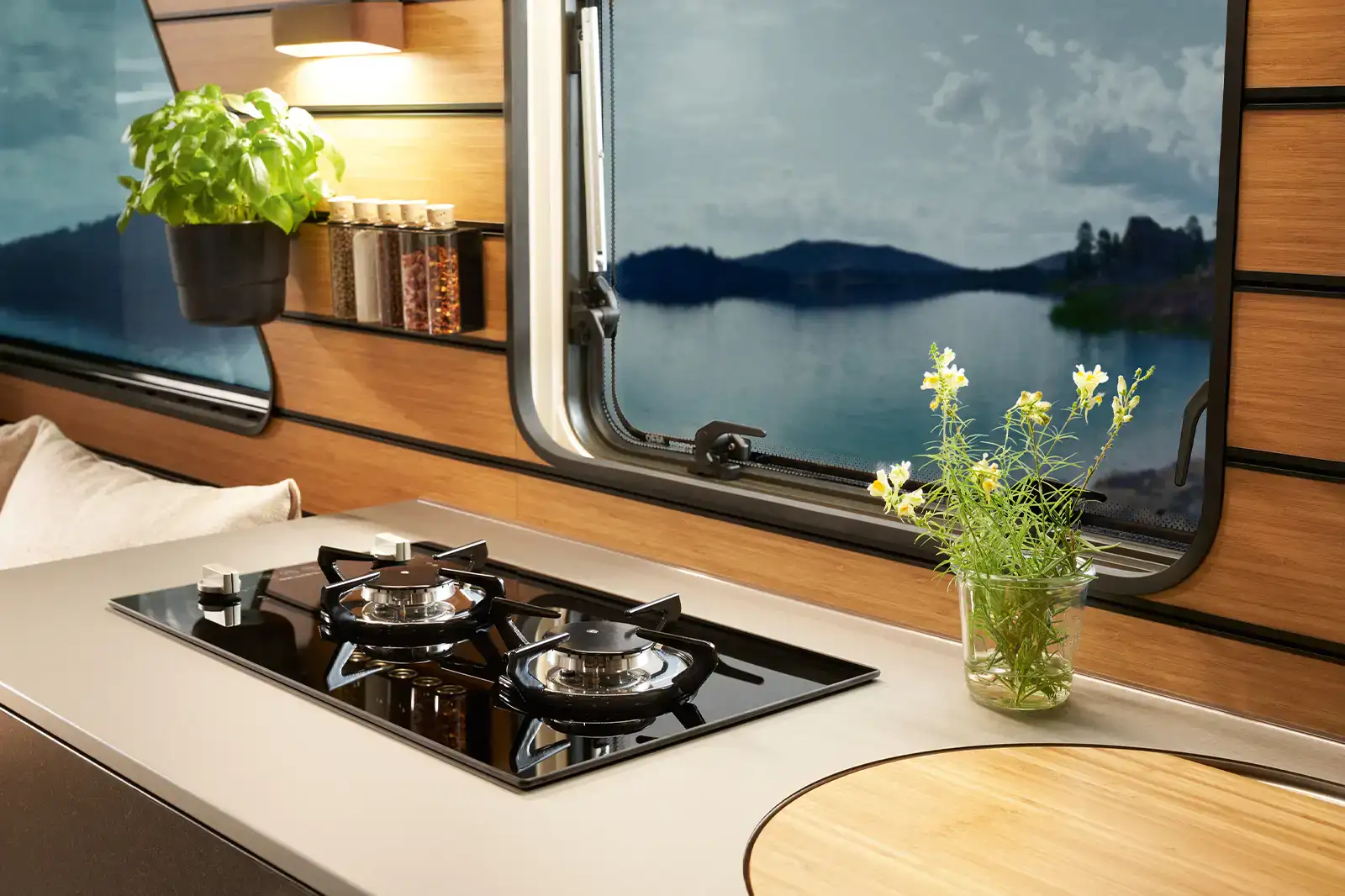 With a wooden board, the sink in the Venture S can be covered, thus enlarging the countertop.